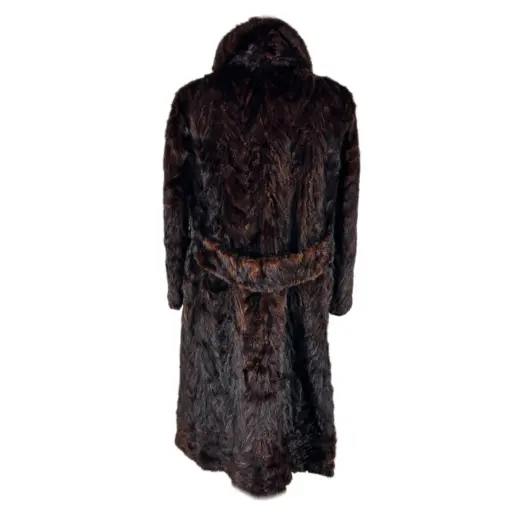 Brown mink fur cape coat hanging on a stylish coat