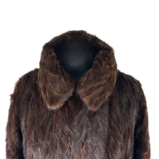 Brown mink fur cape coat paired with a chic outfit