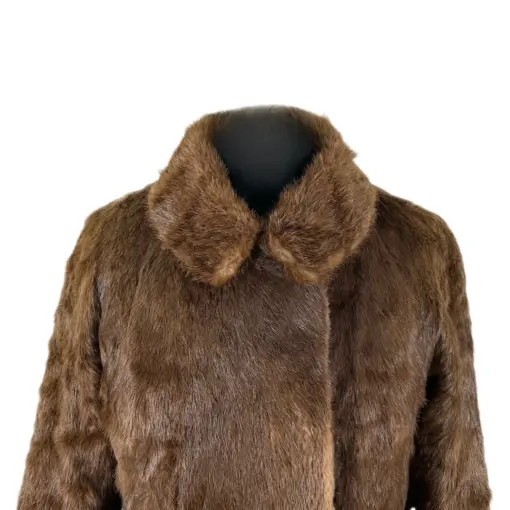 Fashionable ensemble featuring a brown faux fur coat