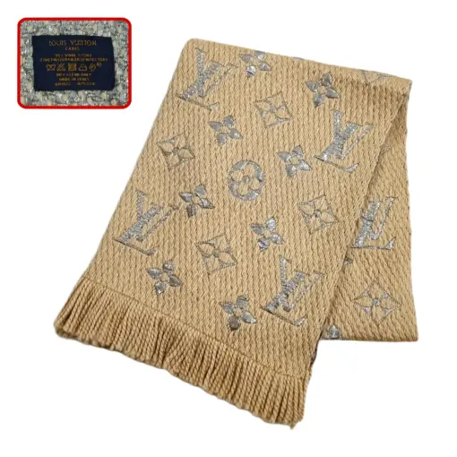 ouis Vuitton monogram pattern on the Beige Wool & Silk Logomania Shine Scarf
