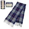 Burberry Mega Check Scarf in navy blue, made from 100% cashmere. Pre-owned luxury with plaid pattern and fringe details. Ideal for winter, fall, and spring.