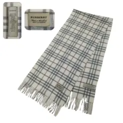 Authentic Burberry 100% cashmere scarf in beige with plaid pattern and fringe accents. Pre-owned luxury scarf for women.