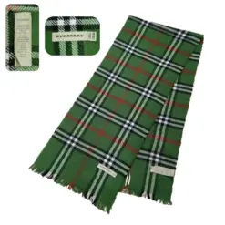 Burberry Light Green Cashmere Nova Check Scarf showing light green color and classic Nova Check pattern, featuring fringe details and Burberry logo. 100% cashmere, pre-owned, in excellent condition.