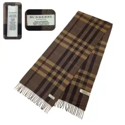 Pre-owned Burberry Nova Check Cashmere Scarf in dark brown, featuring a classic design with fringe accents and the iconic logo. Made from 100% cashmere, offering luxurious warmth and style.