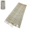 Pre-owned Burberry Giant Check Cashmere Scarf in cream with fringe accents and the Burberry logo. Made from 100% cashmere, offering luxurious warmth and a classic design for women.